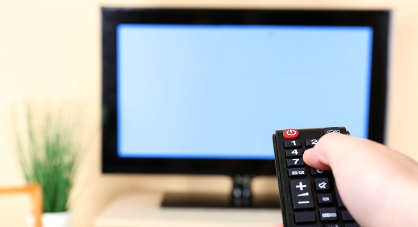 Watching TV and using remote controller